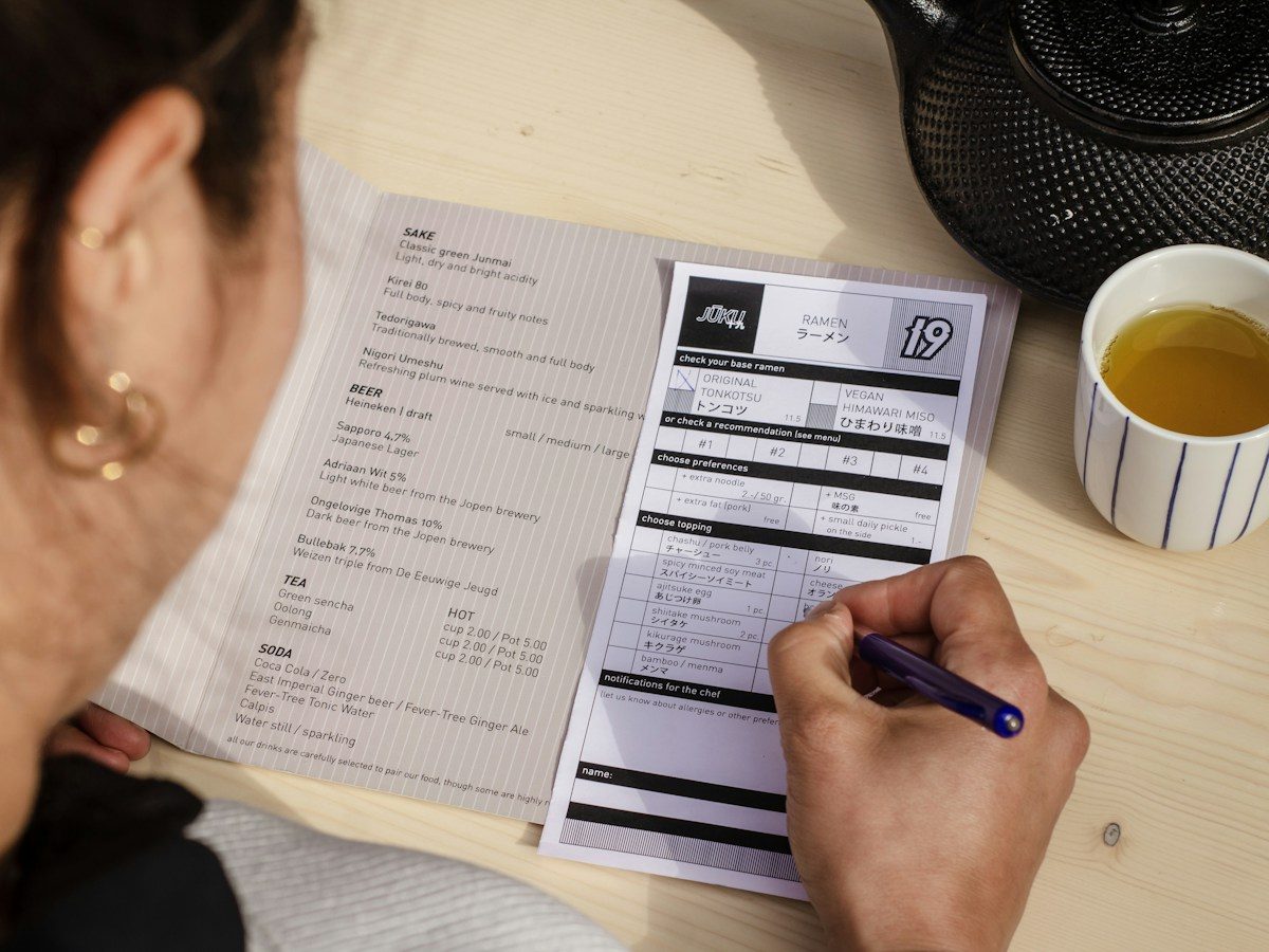 Customer filling in a paper order form