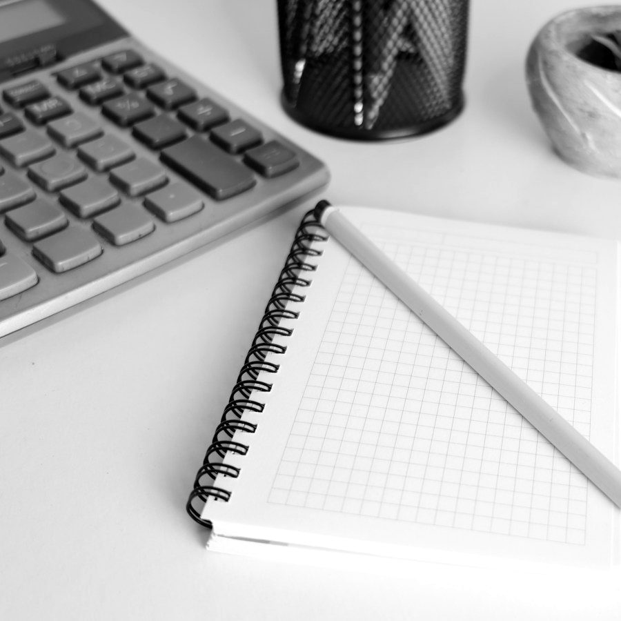 Calculator and notebook for quotes and invoices