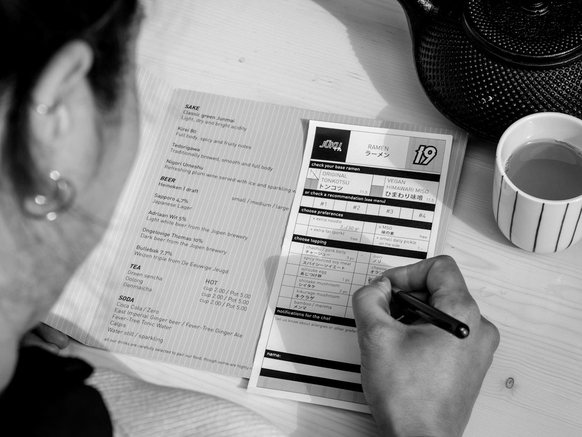 Customer filling in a paper order form